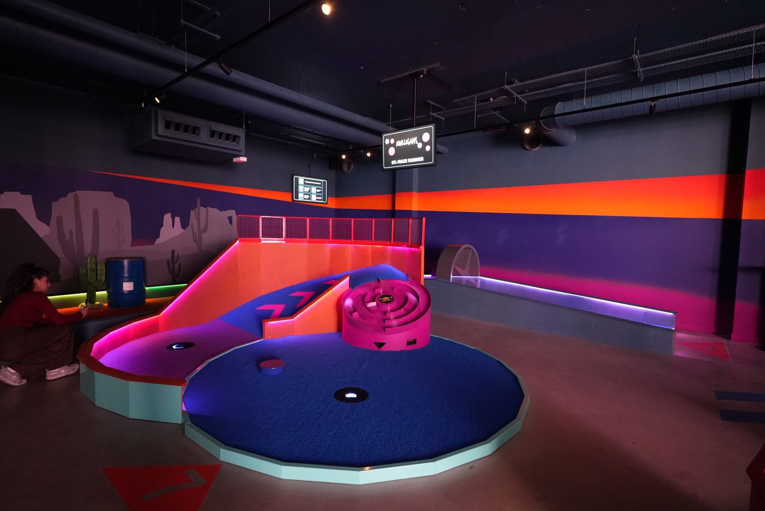 indoor crazy golf venue with leds
